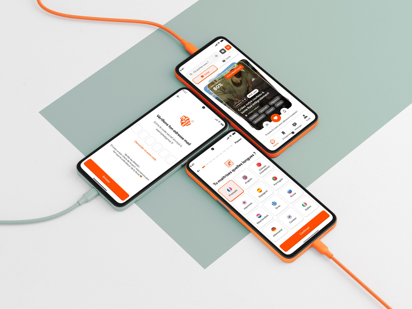 Trois smartphones et leurs chargeurs orange sur une table, mettant en avant le design de l'application MeetPeople par humatis.